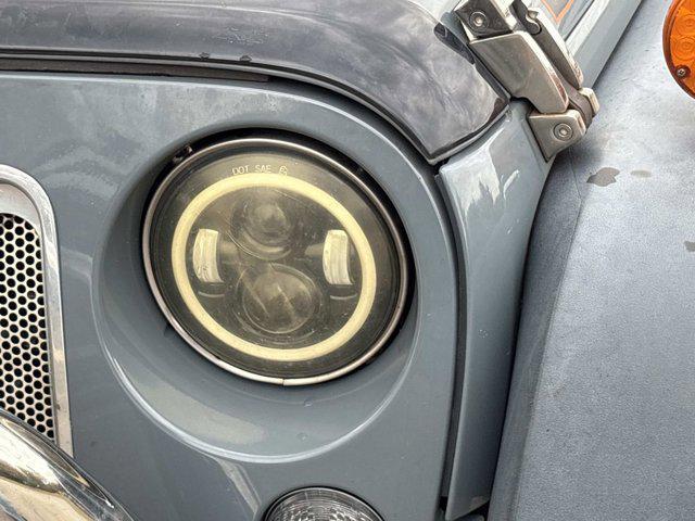 used 2014 Jeep Wrangler Unlimited car, priced at $17,994