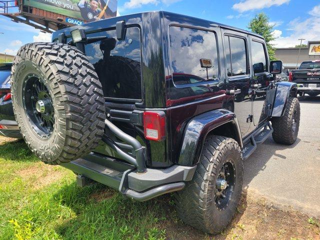 used 2014 Jeep Wrangler Unlimited car, priced at $19,700
