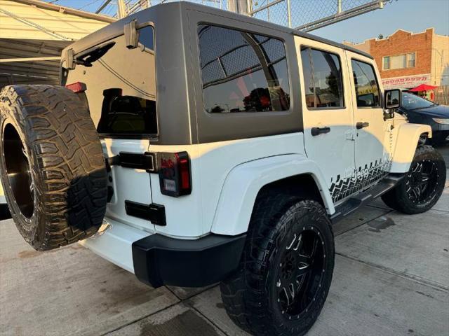 used 2016 Jeep Wrangler Unlimited car, priced at $27,999