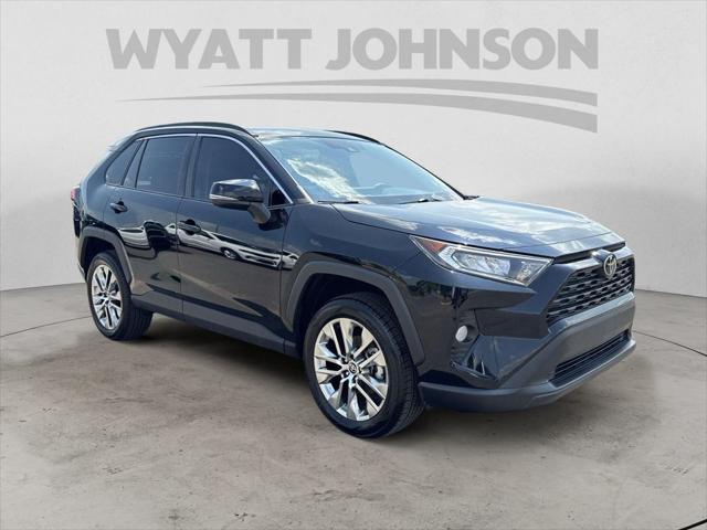 used 2021 Toyota RAV4 car, priced at $32,000