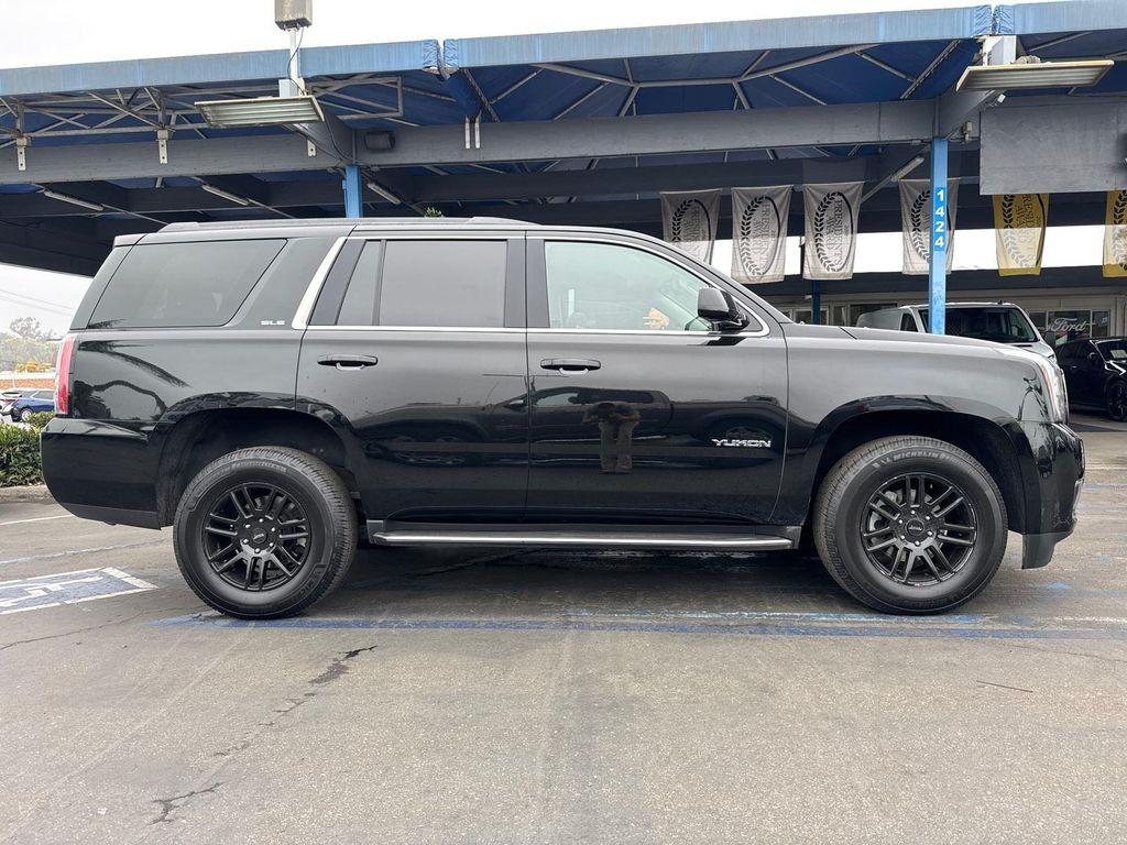 used 2019 GMC Yukon car, priced at $23,680