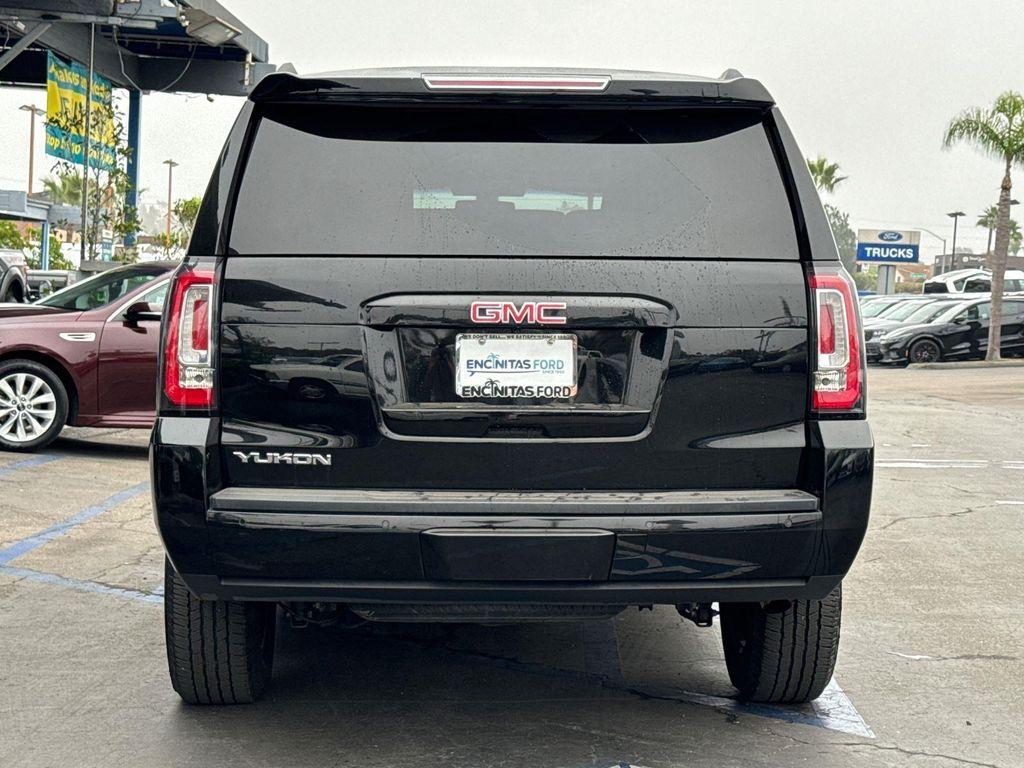 used 2019 GMC Yukon car, priced at $23,680