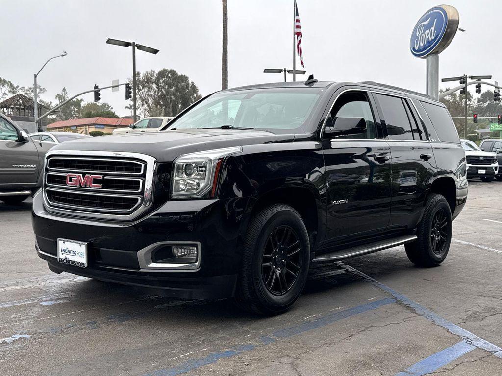 used 2019 GMC Yukon car, priced at $23,680
