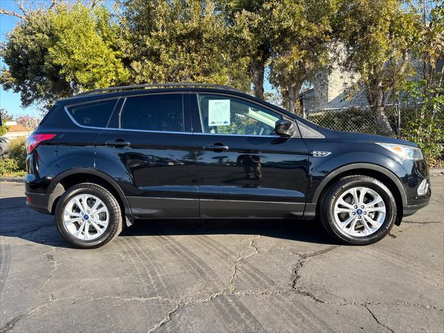 used 2018 Ford Escape car, priced at $12,980