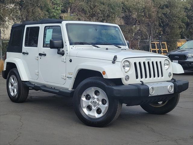 used 2014 Jeep Wrangler Unlimited car, priced at $16,612