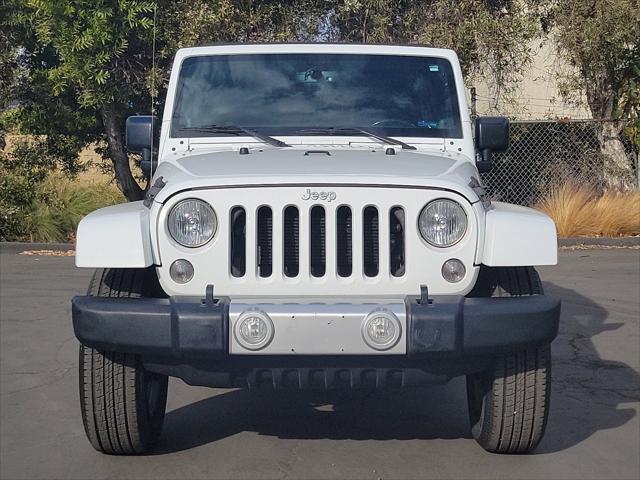 used 2014 Jeep Wrangler Unlimited car, priced at $16,612