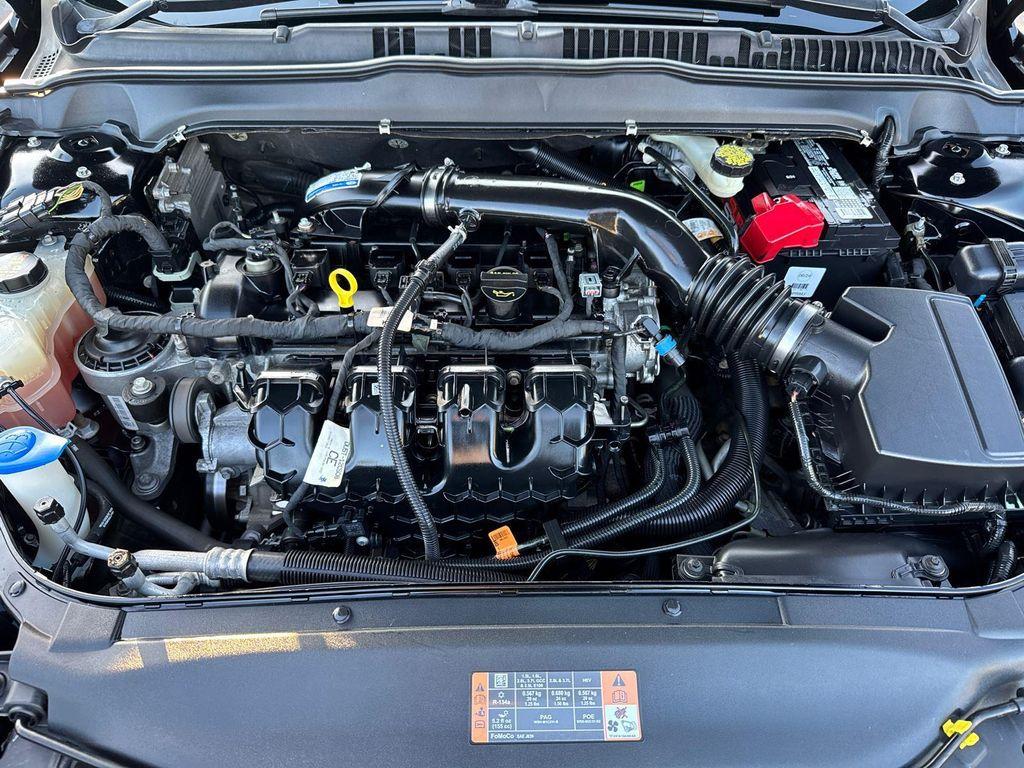 used 2016 Ford Fusion car, priced at $11,680