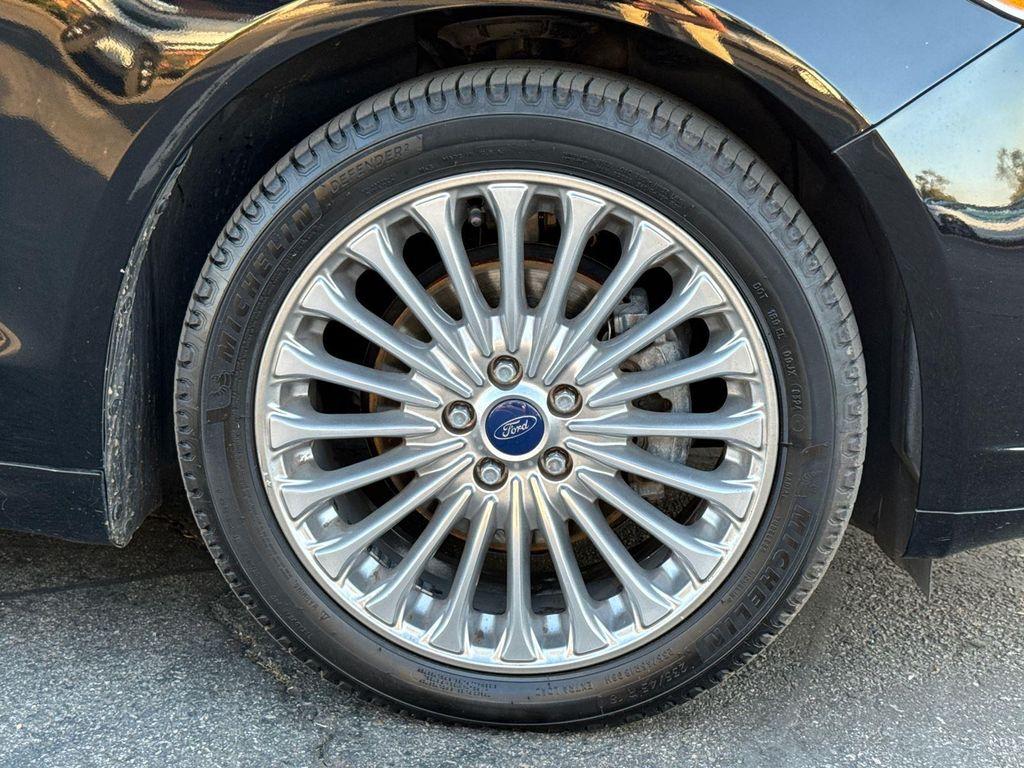 used 2016 Ford Fusion car, priced at $11,680