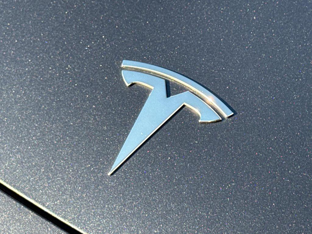 used 2025 Tesla Model 3 car, priced at $35,980