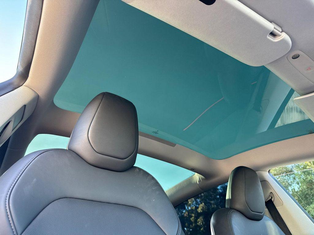 used 2025 Tesla Model 3 car, priced at $35,980