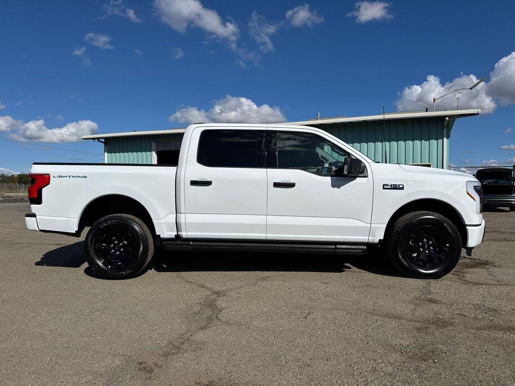 used 2025 Ford F-150 Lightning car, priced at $49,380