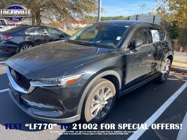 used 2021 Mazda CX-5 car, priced at $26,784