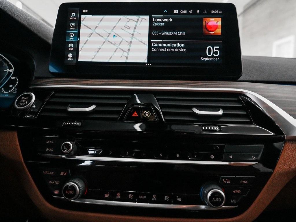 used 2023 BMW 530e car, priced at $30,890