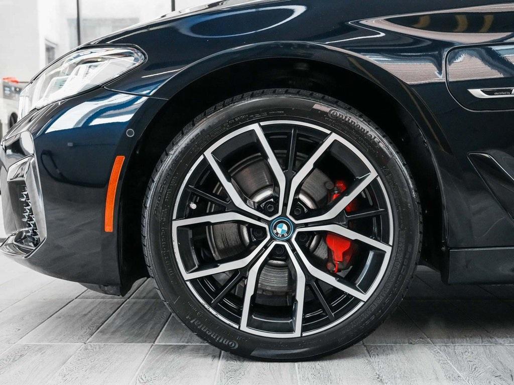 used 2023 BMW 530e car, priced at $30,890