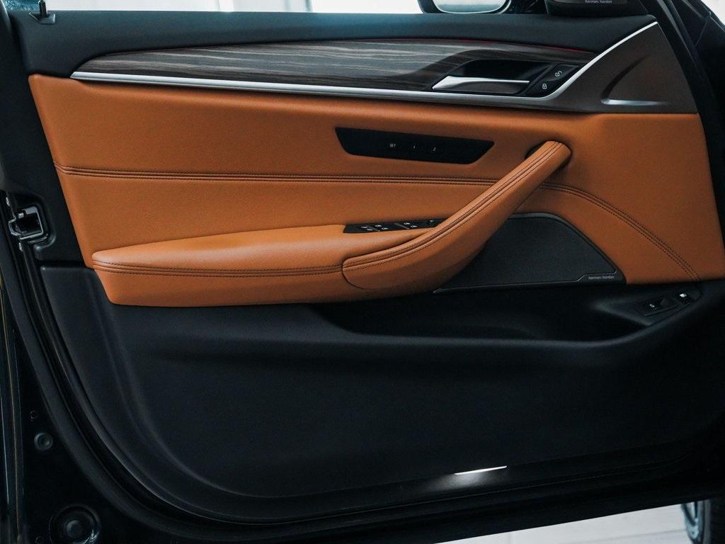 used 2023 BMW 530e car, priced at $30,890