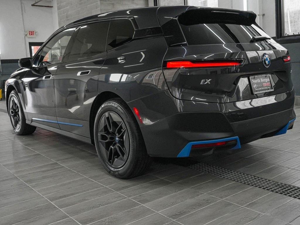 used 2024 BMW iX car, priced at $56,990