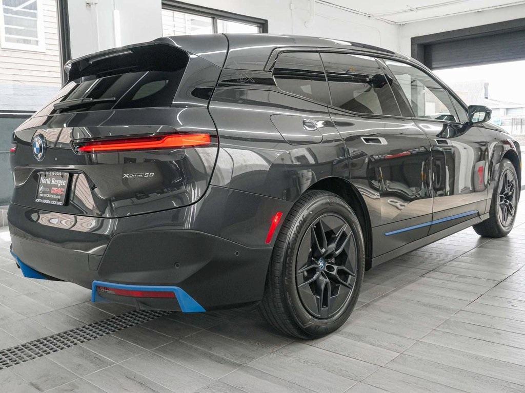 used 2024 BMW iX car, priced at $56,990
