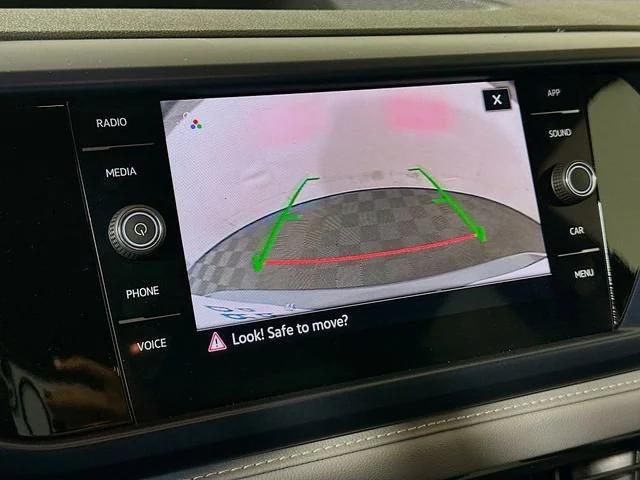 used 2024 Volkswagen Taos car, priced at $22,657