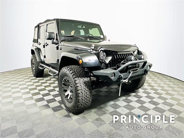 used 2014 Jeep Wrangler Unlimited car, priced at $20,381