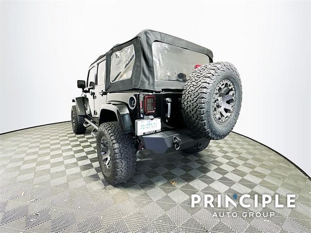 used 2014 Jeep Wrangler Unlimited car, priced at $19,987