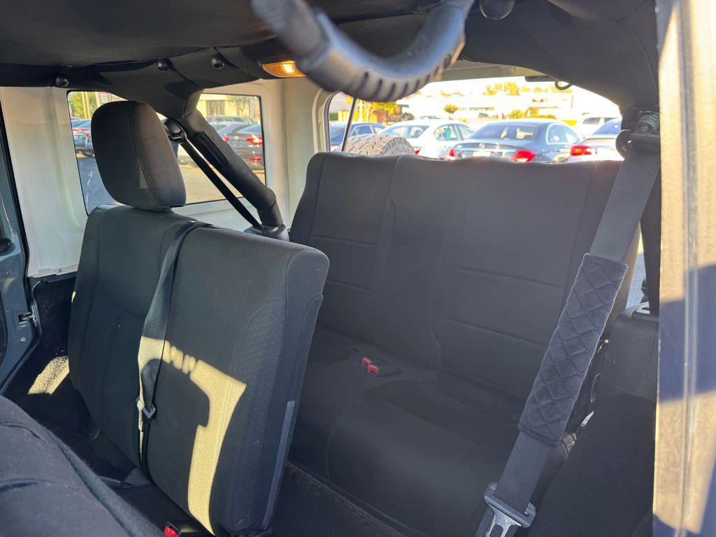 used 2014 Jeep Wrangler Unlimited car, priced at $16,995