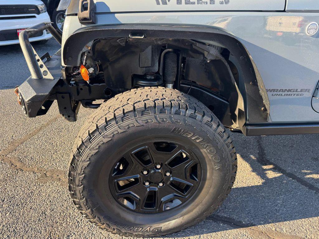 used 2014 Jeep Wrangler Unlimited car, priced at $16,995