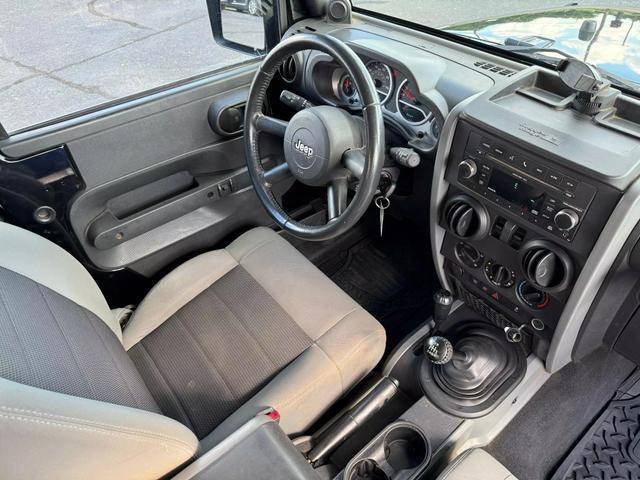 used 2010 Jeep Wrangler car, priced at $15,995