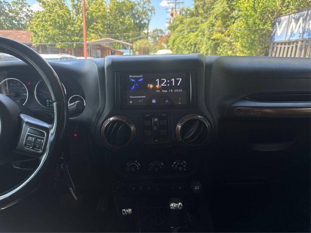 used 2015 Jeep Wrangler Unlimited car, priced at $14,900