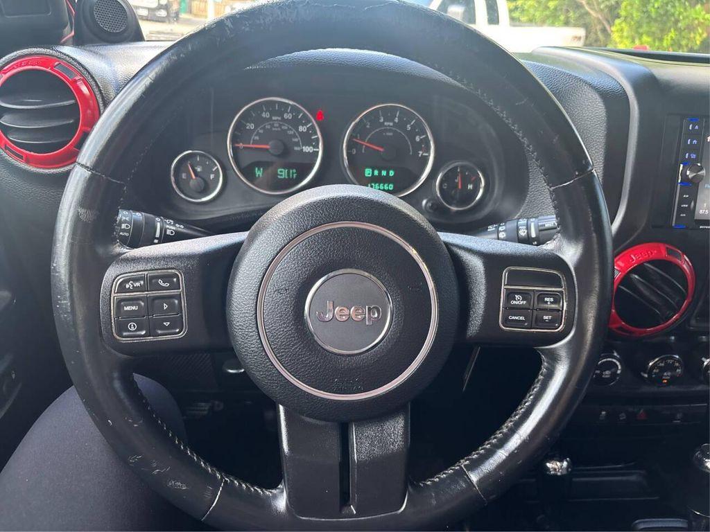 used 2013 Jeep Wrangler Unlimited car, priced at $16,900