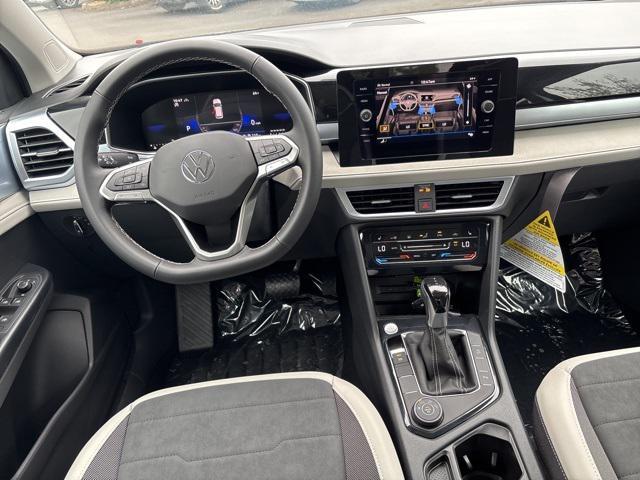 new 2025 Volkswagen Taos car, priced at $30,090