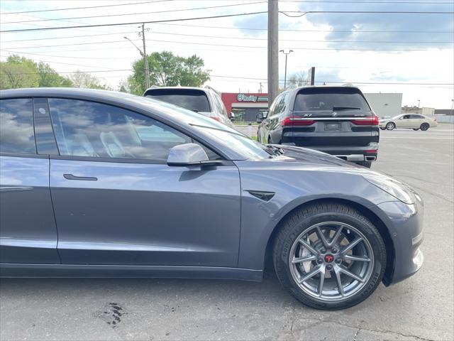 used 2022 Tesla Model 3 car, priced at $17,695