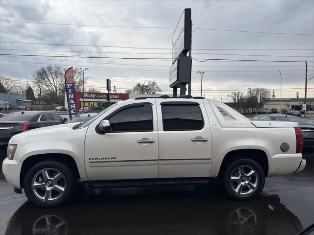 used 2011 Chevrolet Avalanche car, priced at $10,000