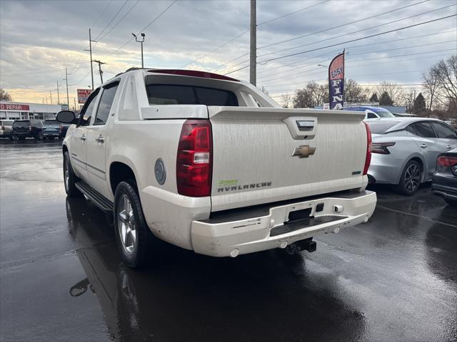 used 2011 Chevrolet Avalanche car, priced at $10,000