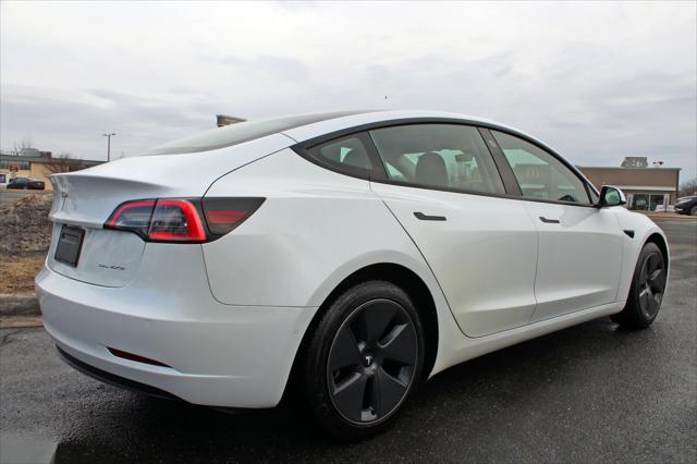 used 2022 Tesla Model 3 car, priced at $26,500