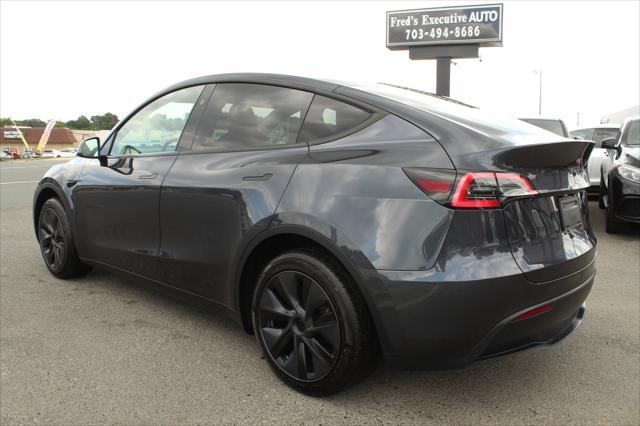used 2025 Tesla Model Y car, priced at $37,997