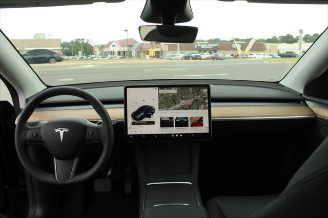 used 2025 Tesla Model Y car, priced at $37,997