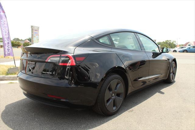 used 2022 Tesla Model 3 car, priced at $27,997