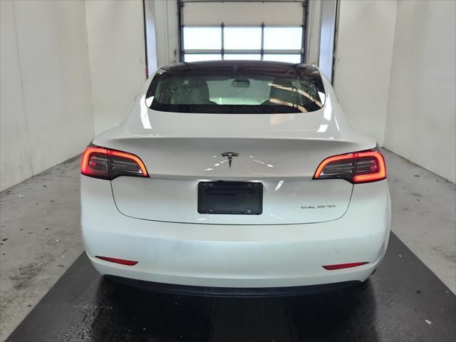 used 2022 Tesla Model 3 car, priced at $25,750