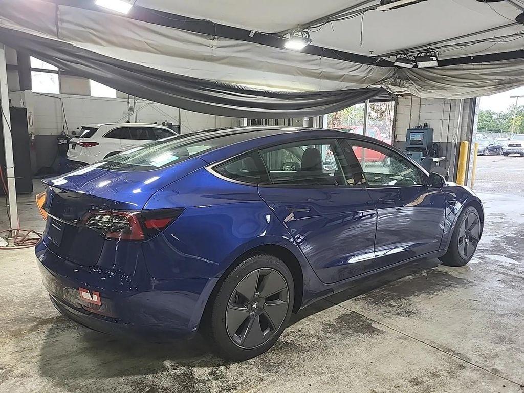 used 2023 Tesla Model 3 car, priced at $25,997