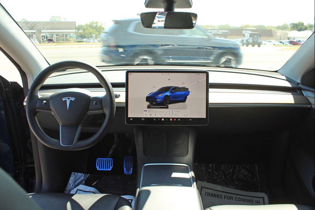 used 2023 Tesla Model Y car, priced at $27,997