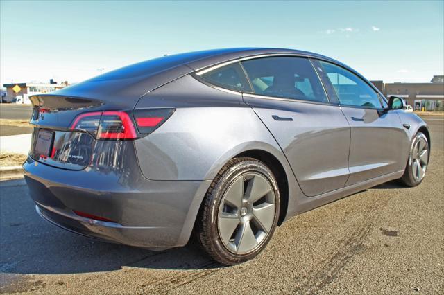 used 2022 Tesla Model 3 car, priced at $27,997