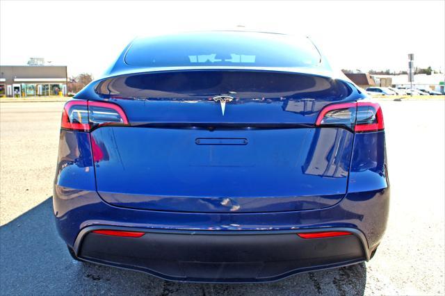 used 2023 Tesla Model Y car, priced at $32,900