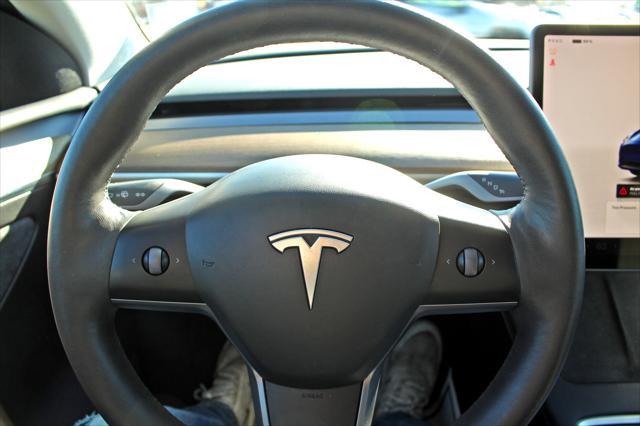 used 2023 Tesla Model Y car, priced at $32,900