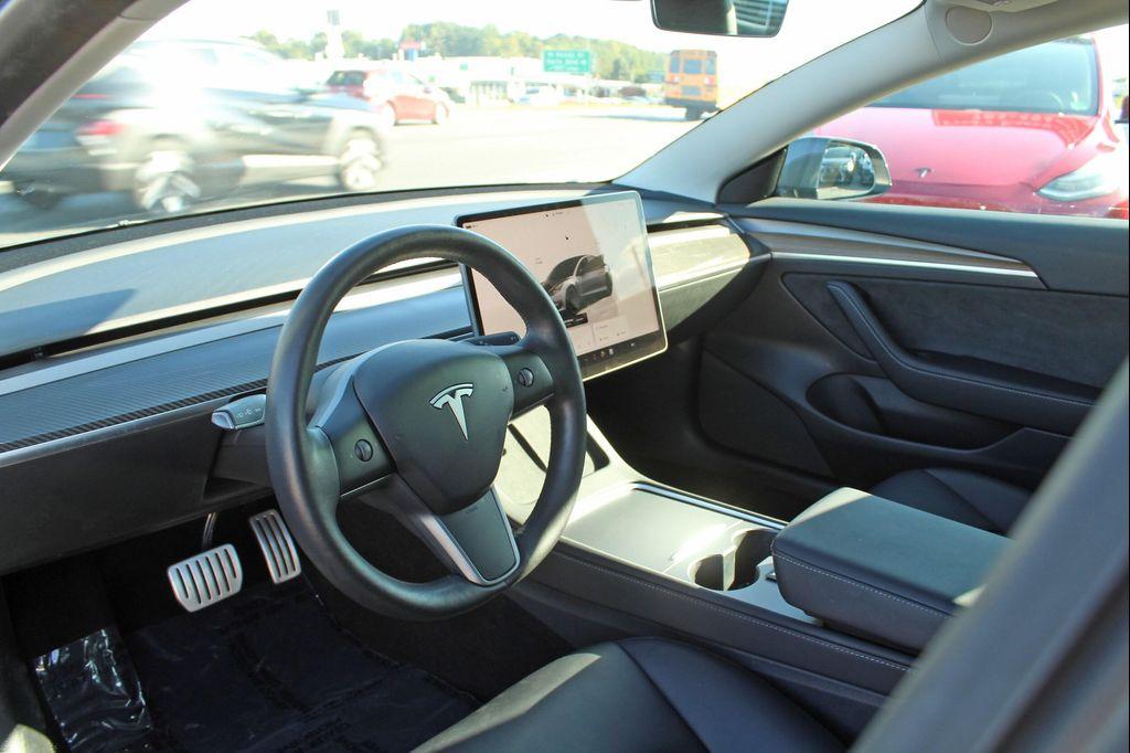 used 2023 Tesla Model 3 car, priced at $32,997