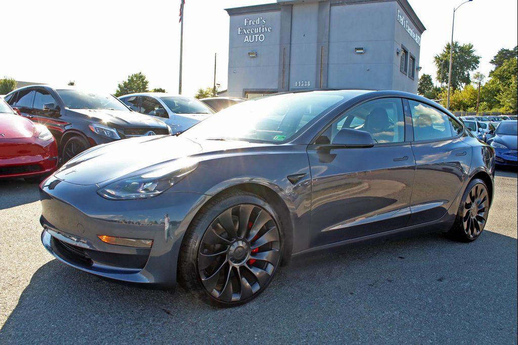 used 2023 Tesla Model 3 car, priced at $32,997
