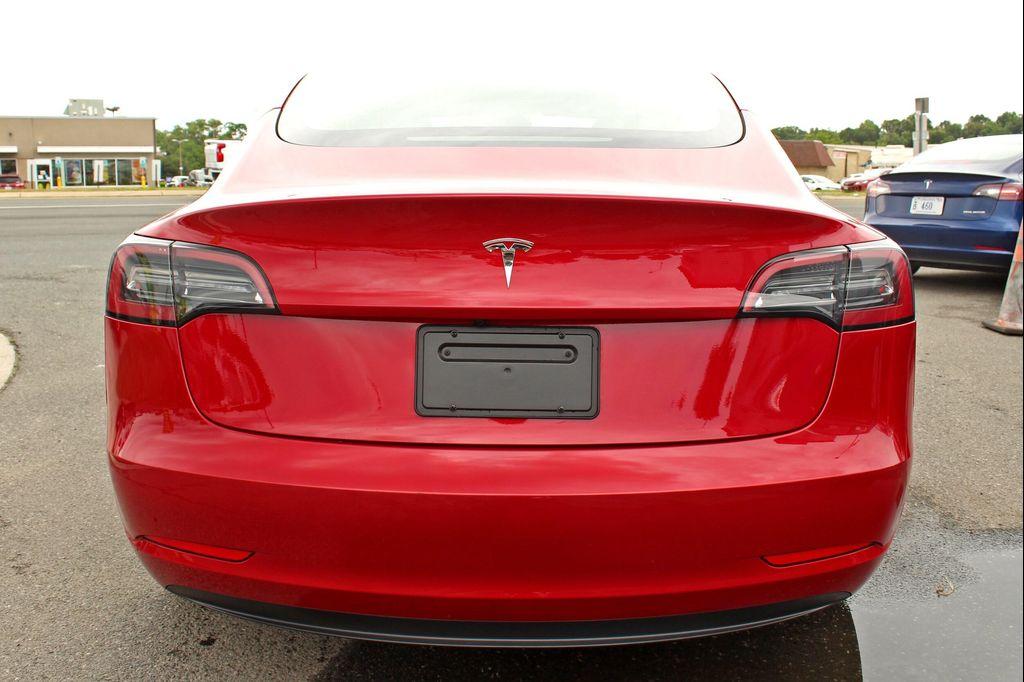 used 2023 Tesla Model 3 car, priced at $25,997