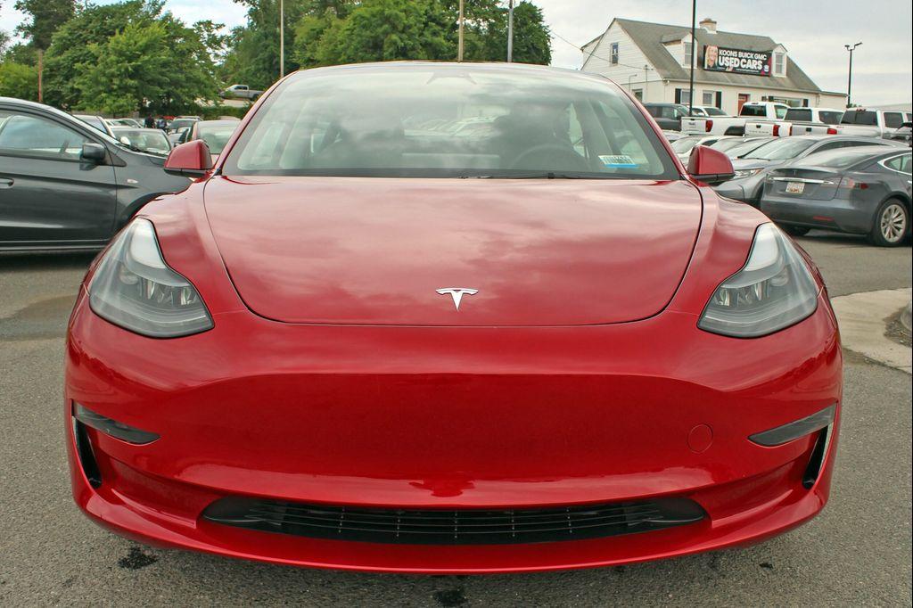 used 2023 Tesla Model 3 car, priced at $25,997