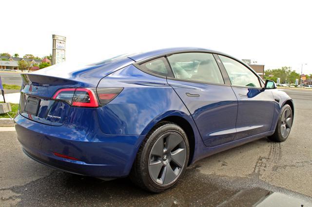 used 2022 Tesla Model 3 car, priced at $27,997