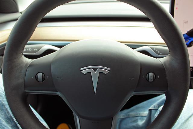 used 2022 Tesla Model 3 car, priced at $27,997