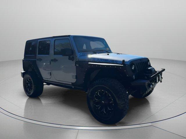 used 2014 Jeep Wrangler Unlimited car, priced at $17,999